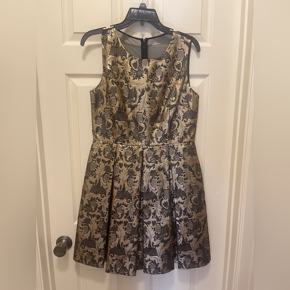 Black and gold brocade cocktail dress.